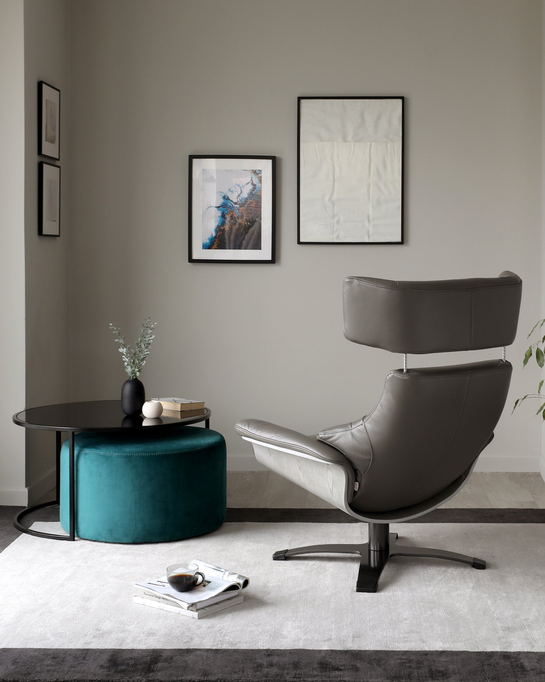 Karma dark grey leather swivel recliner accent chair and footstool