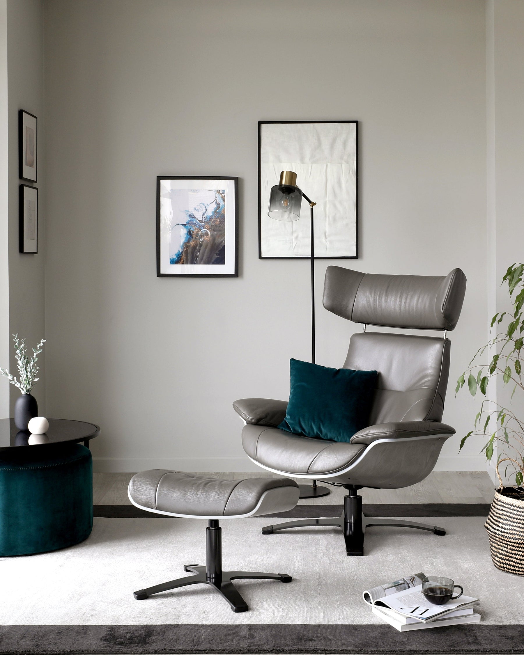 Karma dark grey leather swivel recliner accent chair and footstool