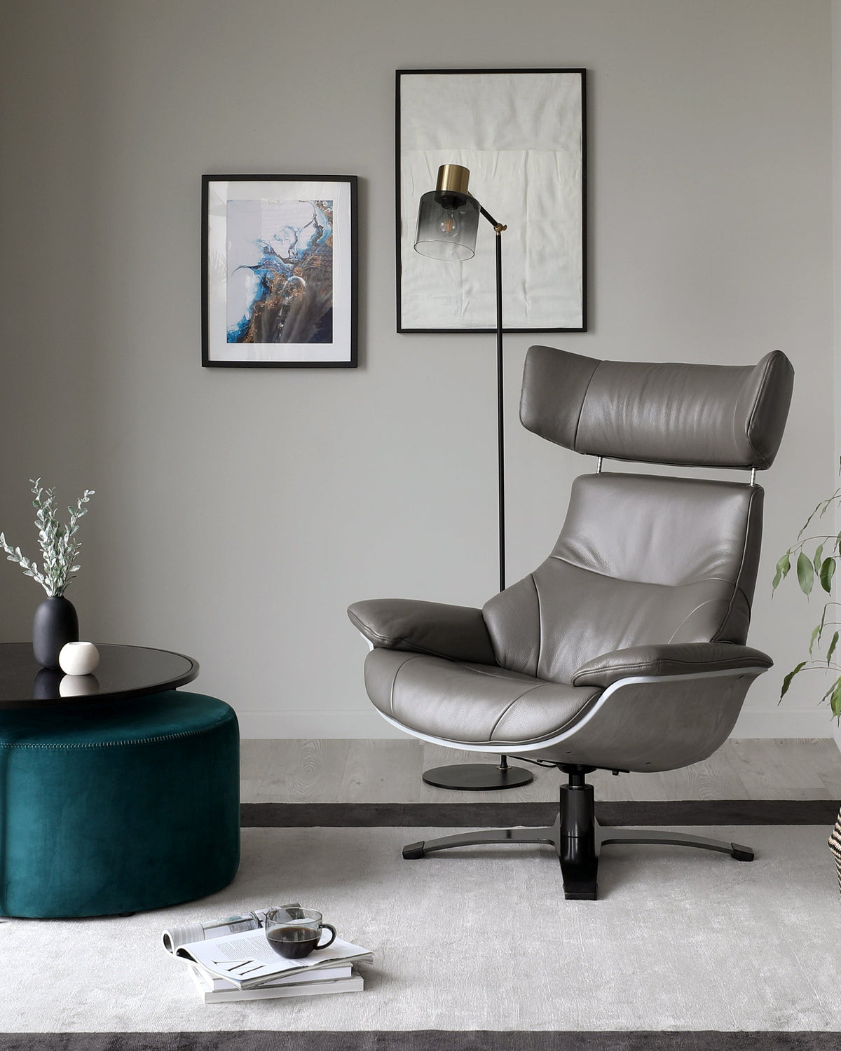 Karma dark grey leather swivel recliner accent chair and footstool