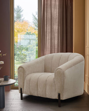 Kendra champagne fabric armchair
