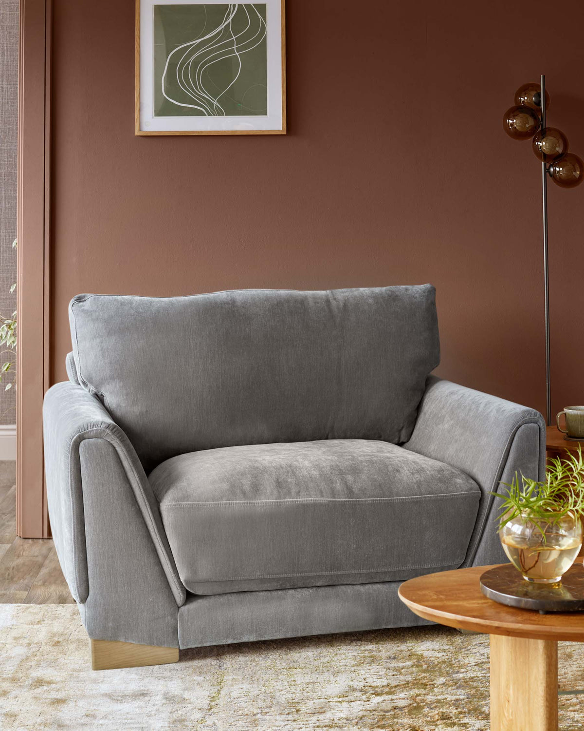 Saige mid grey fabric armchair with natural wood legs
